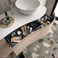 Qué estilos de diseño suelen encontrarse en los muebles de baño curvos